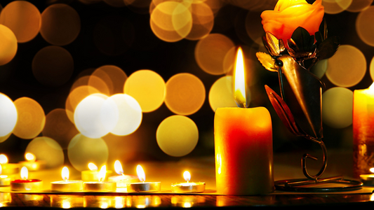 A big candle and many small candle is lighting