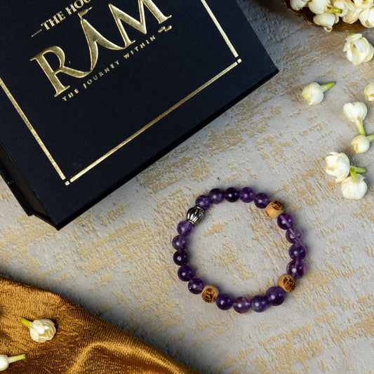 Amethyst stone bracelet with ram engraved beads